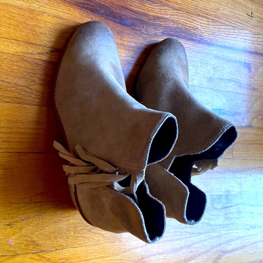 Cole Haan slip on fringe booties.